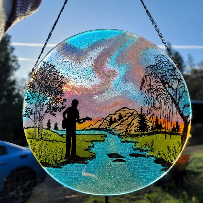 Man Playing Guitar River Mountain Trees Sunset Shillouette Cremation Ashes InFused Glass Memorial Sun Catcher 10 inch