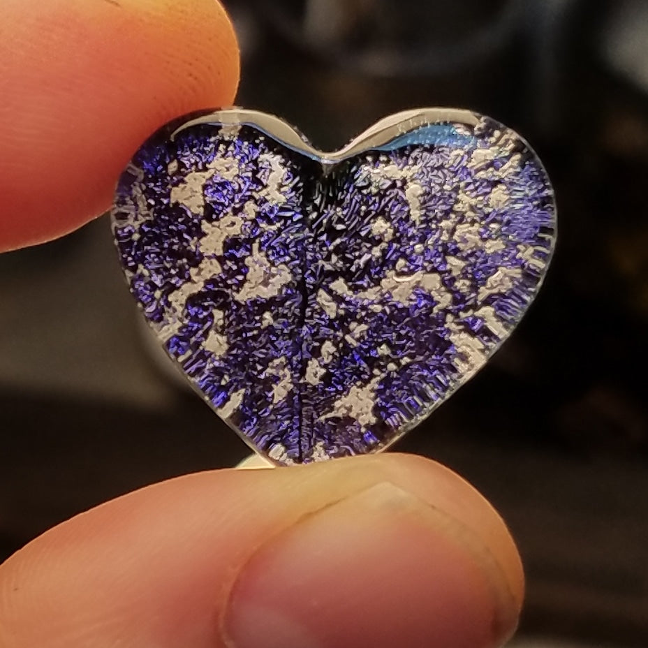 purple glass cremation heart in fingers Handmade Cremation Jewelry Pendants, Rings and Bracelets. Ashes in Glass Handmade . Sympathy Gifts, Mourning Jewelry. Cremation Ashes Infused in Glass. Quality Sterling Silver and 14k Gold USA Handmade by Infusion Glass  Human & Pet Cremation Ash Remembrance Urns